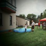 Gallery 1 - Image of last year's party, a child cheers after catching a toy fish in the inflatable fishing hole