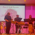 Gallery 1 - A group of musicians playing drums